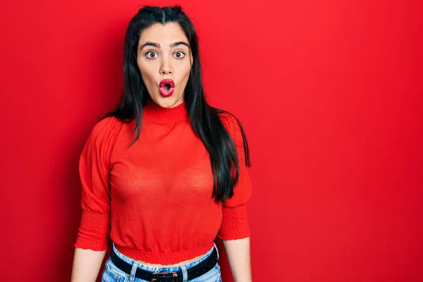 Young Hispanic Girl Wearing Casual Clothes Scared Amazed Open Mouth — Stock Photo, Image