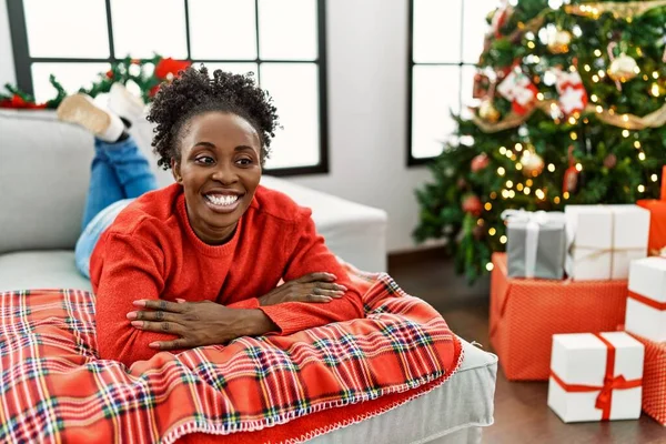 Young African American Woman Lying Sofa Christmas Tree Happy Face — Fotografia de Stock