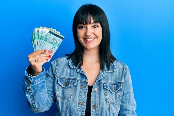 Young Hispanic Woman Holding Malaysia Ringgit Banknotes Looking Positive Happy — Stock fotografie