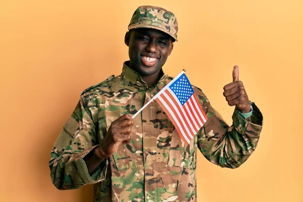 Young African American Man Wearing Army Uniform Holding American Flag — Stock Fotó