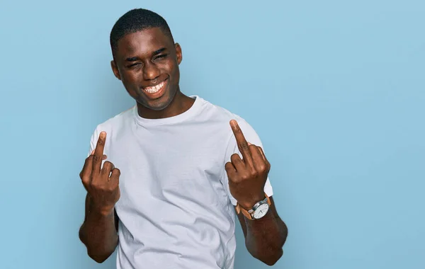 Young African American Man Wearing Casual White Shirt Showing Middle — Stockfoto
