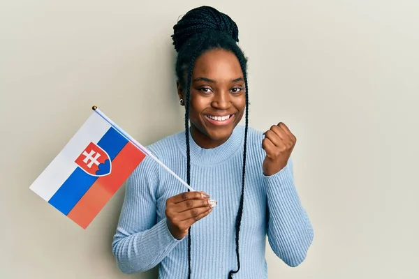 African American Woman Braided Hair Holding Slovakia Flag Screaming Proud — Stockfoto