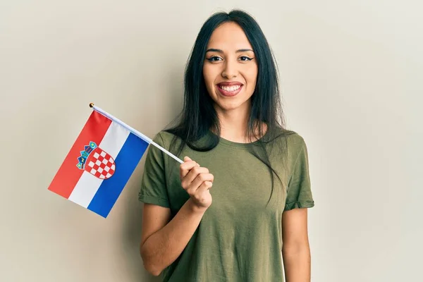 Young Hispanic Girl Holding Croatia Flag Looking Positive Happy Standing — Stockfoto