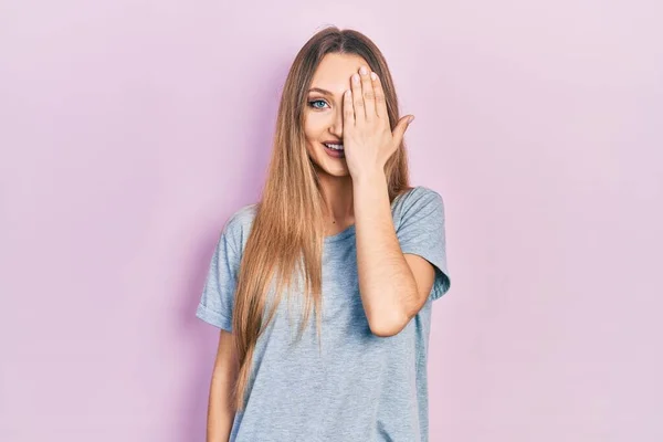 Young Blonde Girl Wearing Casual Shirt Covering One Eye Hand — Foto de Stock