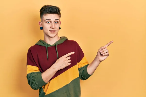 Young Caucasian Boy Ears Dilation Wearing Casual Sweatshirt Smiling Looking — Stok fotoğraf