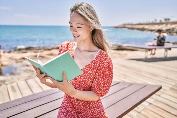 Young Chinese Girl Smiling Happy Reading Book Beach — Stock Photo, Image