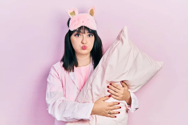 Young Hispanic Woman Wearing Sleep Mask Pajama Sleeping Pillow Puffing — Stockfoto