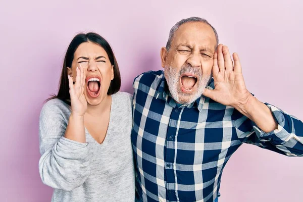 Hispanic Father Daughter Wearing Casual Clothes Shouting Screaming Loud Side — Stockfoto