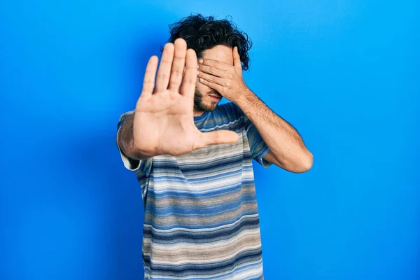 Handsome Hispanic Man Wearing Casual Clothes Pink Background Covering Eyes — Fotografia de Stock