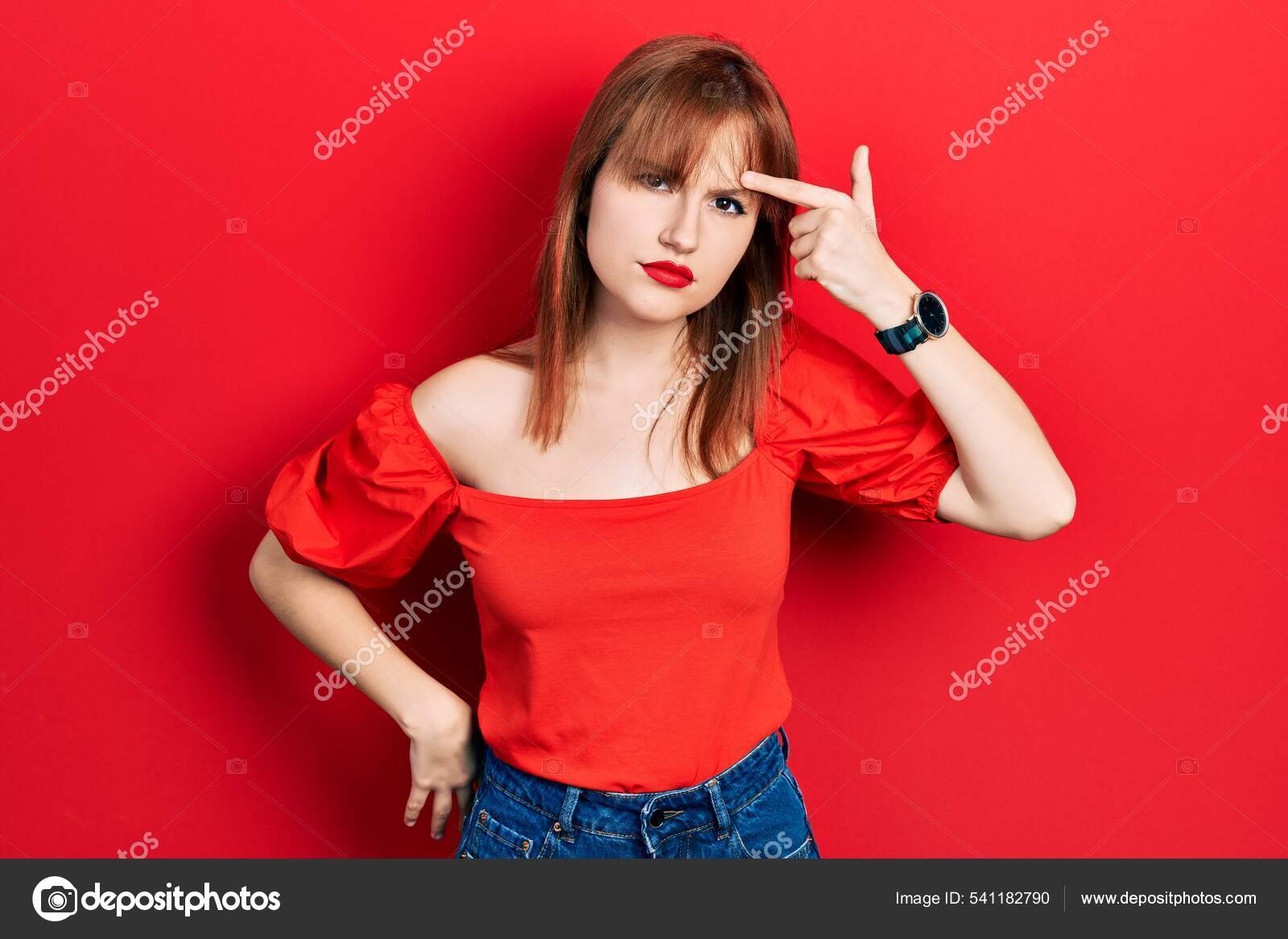 Redhead Young Woman Wearing Casual Red Shirt Pointing Unhappy