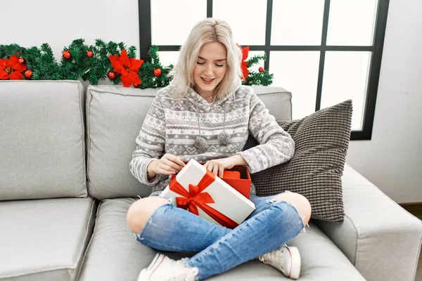 Young Caucasian Girl Smiling Happy Opening Christmas Gift Home — Fotografia de Stock