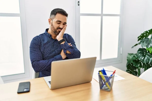 Young Hispanic Man Beard Working Office Laptop Thinking Looking Tired — Fotografia de Stock