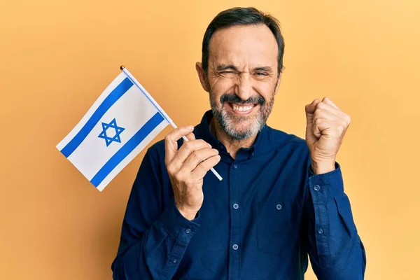 Middle Age Hispanic Man Holding Israel Flag Screaming Proud Celebrating — Fotografia de Stock