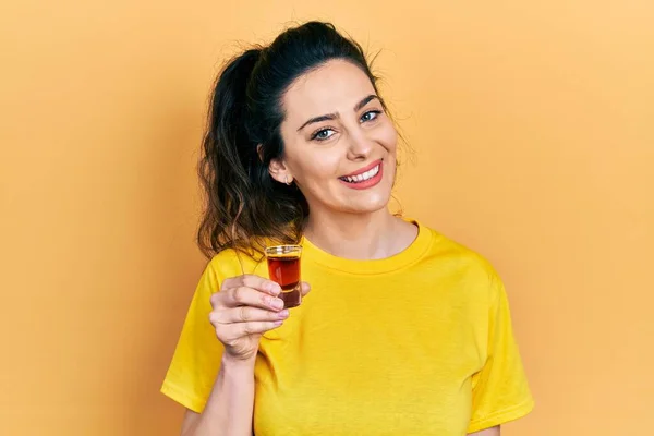 Young Hispanic Woman Drinking Whiskey Shot Looking Positive Happy Standing — 图库照片
