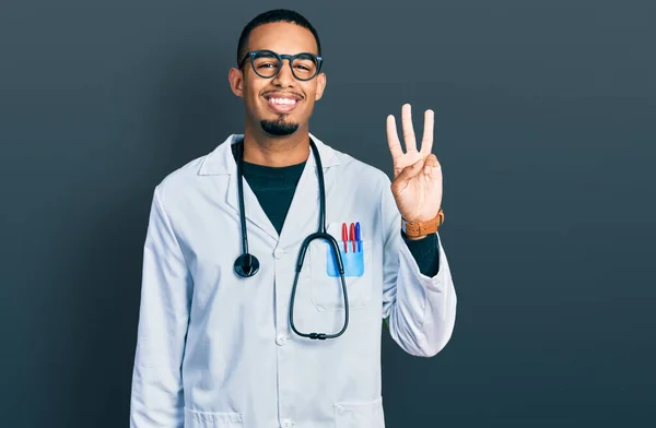 Young African American Man Wearing Doctor Uniform Stethoscope Showing Pointing — Stok fotoğraf