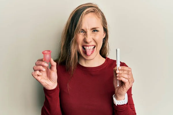 Young Blonde Woman Holding Menstrual Cup Tampon Sticking Tongue Out — Stok fotoğraf