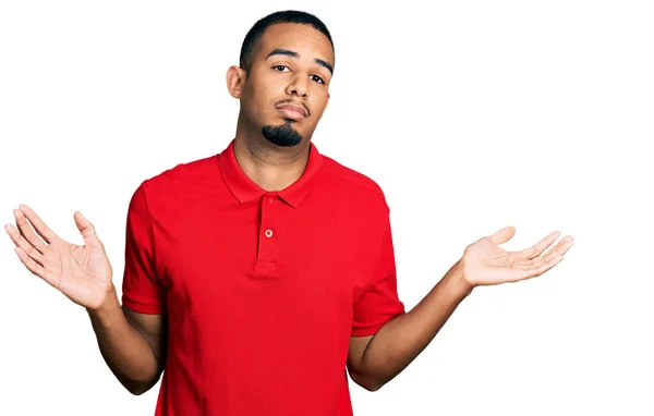 Young African American Man Wearing Casual Polo Clueless Confused Open — ストック写真
