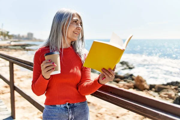 Middle Age Grey Haired Woman Drinking Coffee Reading Book Beach — Stock Photo, Image