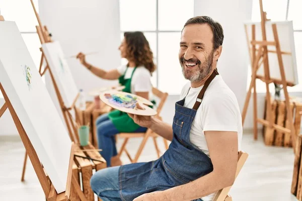 Hispanic Middle Age Man Mature Woman Art Studio Looking Positive — 图库照片