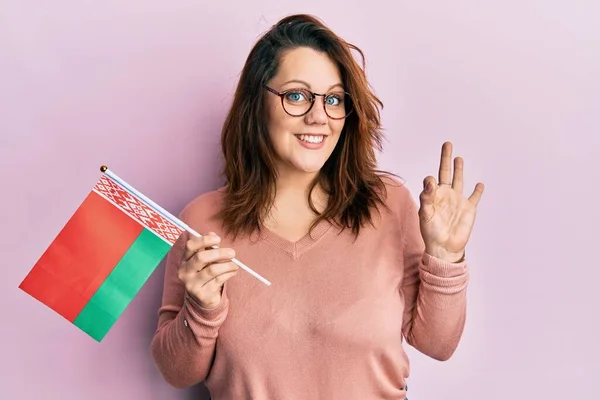 Young Caucasian Woman Holding Belarus Flag Doing Sign Fingers Smiling — Stock fotografie