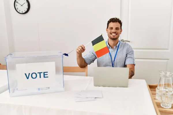 Young Hispanic Man Smiling Confident Holding Belgium Flag Working Electoral —  Fotos de Stock
