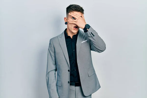 Young Caucasian Boy Ears Dilation Wearing Business Jacket Peeking Shock — Stockfoto