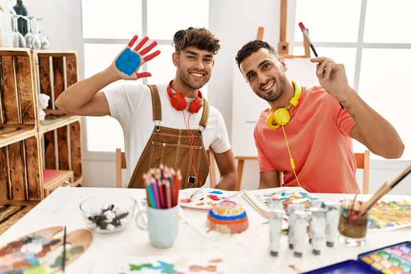 Two Hispanic Men Couple Smiling Confident Showing Painted Palm Hands — Stock Photo, Image