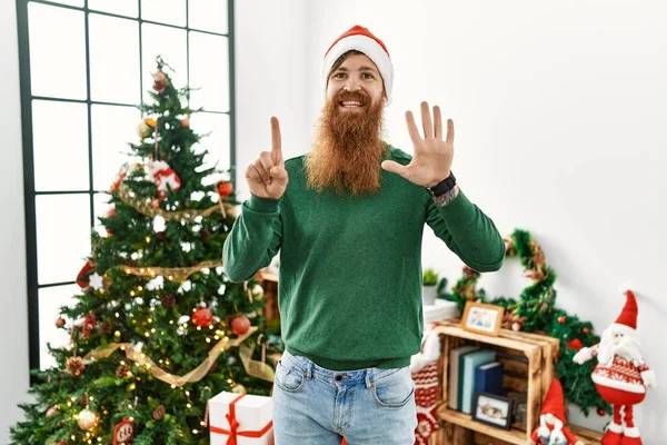 Redhead Man Long Beard Wearing Christmas Hat Christmas Tree Showing — Photo