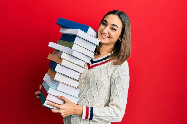 Young Brunette Student Girl Holding Pile Books Smiling Happy Cool — Foto de Stock