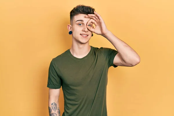Young Caucasian Boy Ears Dilation Wearing Casual Green Shirt Smiling — Stok fotoğraf