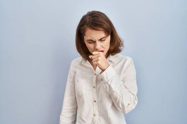 Young Beautiful Woman Standing Casual Blue Background Feeling Unwell Coughing — стоковое фото