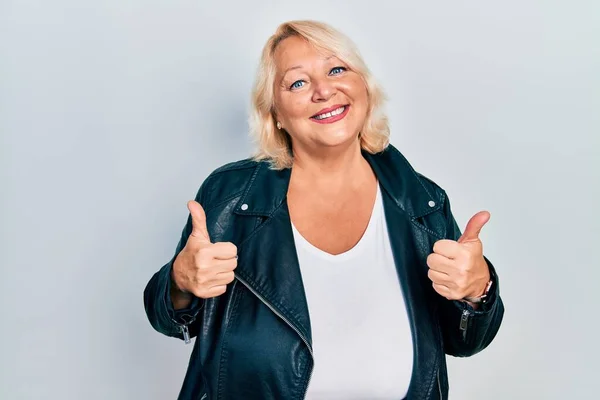 Middle Age Blonde Woman Wearing Leather Jacket Success Sign Doing — Stock Photo, Image
