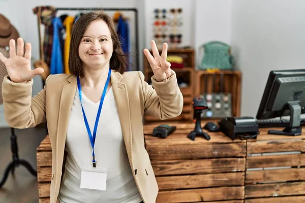 Young Syndrome Woman Working Manager Retail Boutique Showing Pointing Fingers — Fotografia de Stock