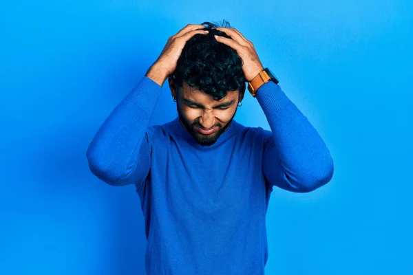Arab Man Beard Wearing Casual Blue Sweater Suffering Headache Desperate — Stock Fotó