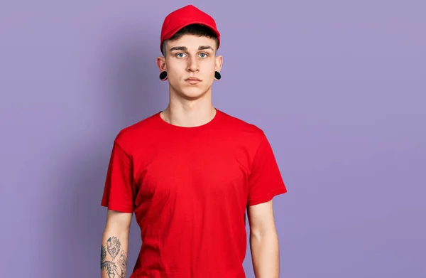 Young Caucasian Boy Ears Dilation Wearing Delivery Uniform Cap Serious — Photo