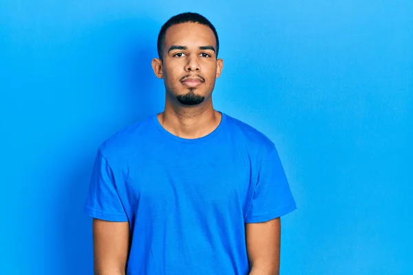 Young African American Man Wearing Casual Blue Shirt Relaxed Serious — стокове фото