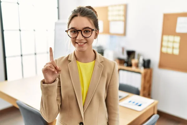 Young Brunette Teenager Wearing Business Style Office Showing Pointing Finger — 스톡 사진