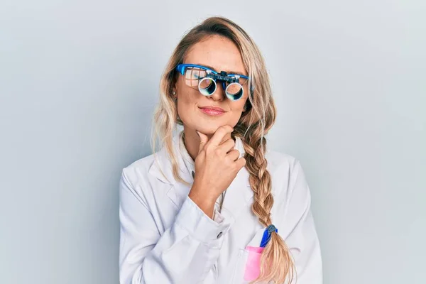 Beautiful Young Blonde Woman Wearing Optometry Glasses Thinking Concentrated Doubt — Stock Fotó