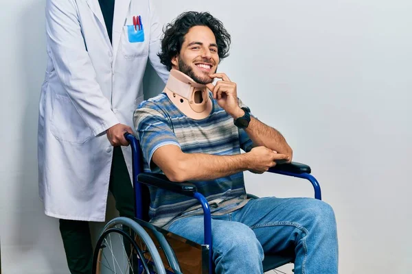Handsome Hispanic Man Sitting Wheelchair Wearing Neck Collar Looking Confident — Stok fotoğraf