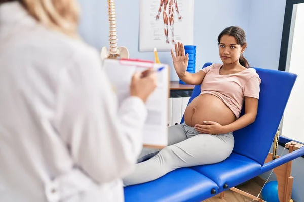 Young Pregnant Woman Physiotherapist Clinic Puffing Cheeks Funny Face Mouth — Stock Photo, Image