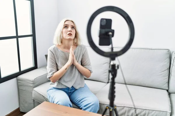 Young Caucasian Woman Recording Vlog Tutorial Smartphone Home Begging Praying — Stock Fotó