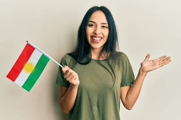Young Hispanic Girl Holding Kurdistan Flag Celebrating Achievement Happy Smile — Fotografia de Stock