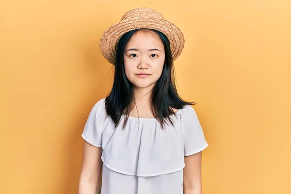 Young Chinese Girl Wearing Summer Hat Serious Expression Face Simple — Stockfoto