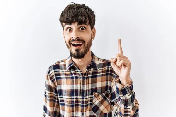Hispanic Man Beard Standing Isolated Background Pointing Finger Successful Idea — Stock Photo, Image