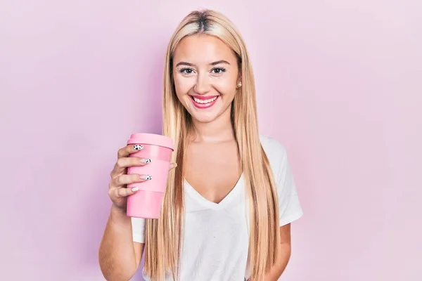 Young Blonde Girl Holding Coffee Looking Positive Happy Standing Smiling — Fotografia de Stock