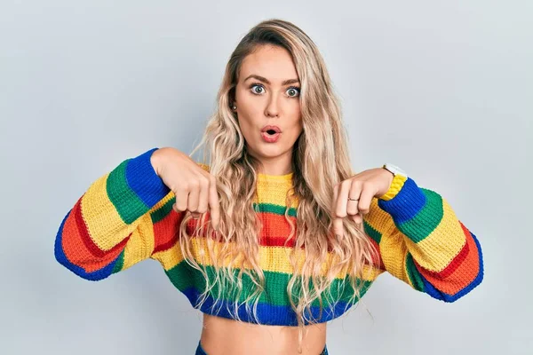Beautiful Young Blonde Woman Wearing Colored Sweater Pointing Fingers Showing — Stockfoto