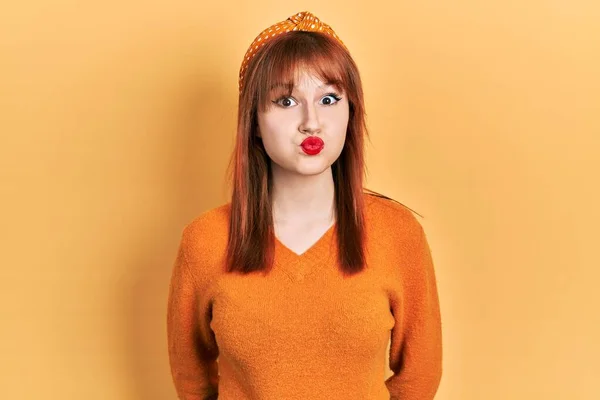 Redhead Young Woman Wearing Casual Orange Sweater Puffing Cheeks Funny — Stock Photo, Image