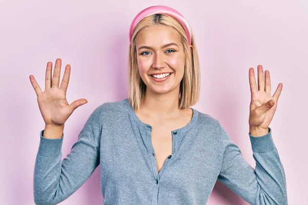 Beautiful Blonde Woman Standing Pink Background Showing Pointing Fingers Number — Stock Photo, Image