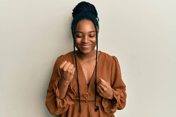African American Woman Braided Hair Wearing Casual Brown Shirt Celebrating — Stock Photo, Image