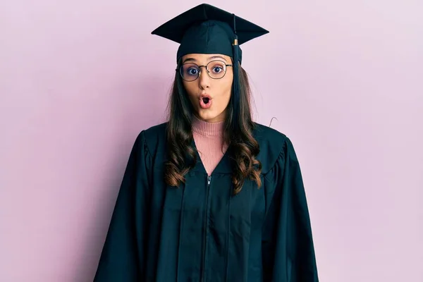 Young Hispanic Woman Wearing Graduation Cap Ceremony Robe Afraid Shocked — Stock Photo, Image